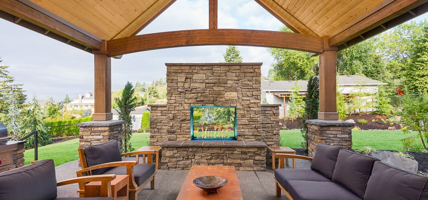 Stock Image - European Home J Series 40H: See-Through Outdoor Gas Fireplace European Home Gas See-Thru Fireplace & Outdoor Fire - Stove Depot and Chimney Works