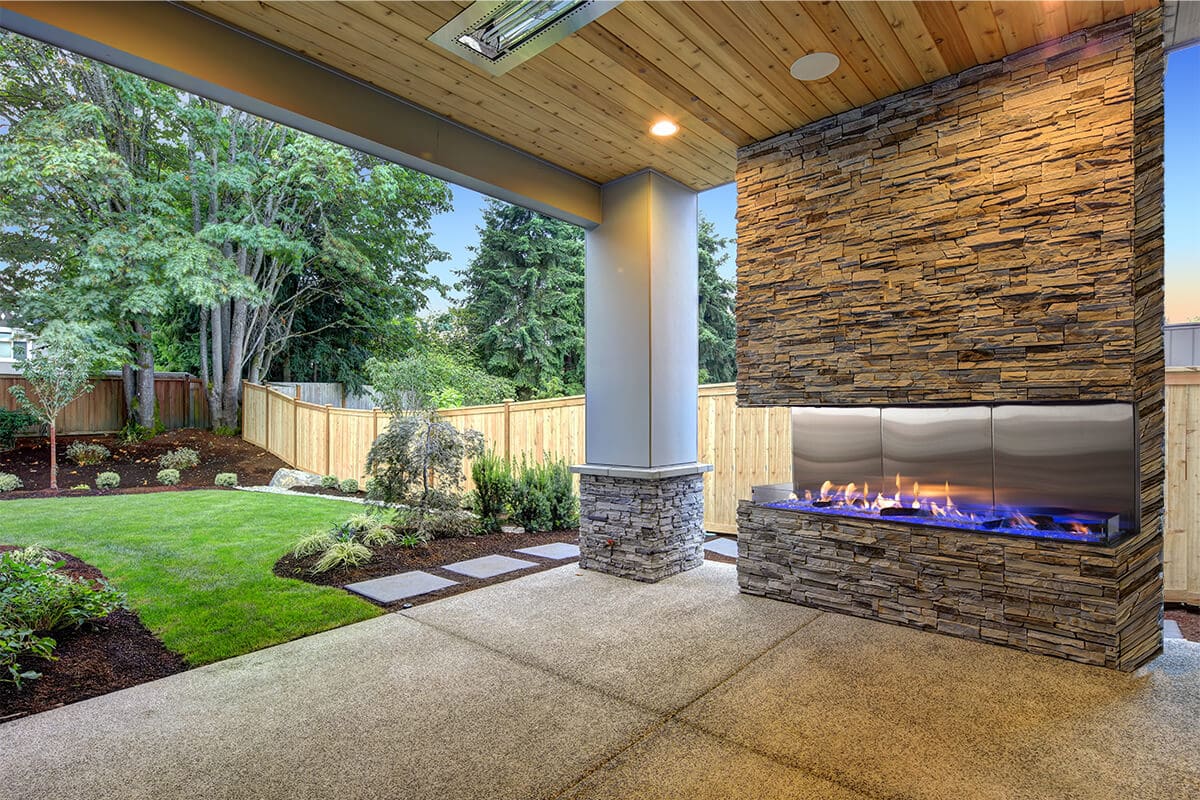 Stock Image - Flare - Outdoor Double Corner Flare Fireplaces Gas Bay Fireplace & Outdoor Fire - Stove Depot and Chimney Works